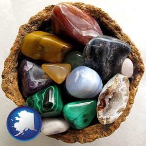 an assortment of polished gemstones - with Alaska icon