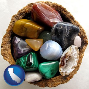 an assortment of polished gemstones - with California icon