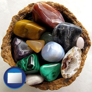 an assortment of polished gemstones - with Colorado icon