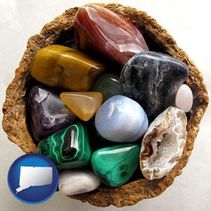 an assortment of polished gemstones - with Connecticut icon