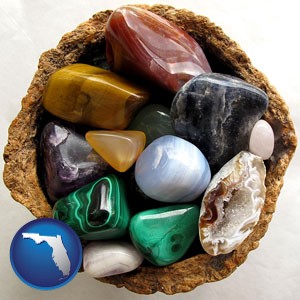 an assortment of polished gemstones - with Florida icon