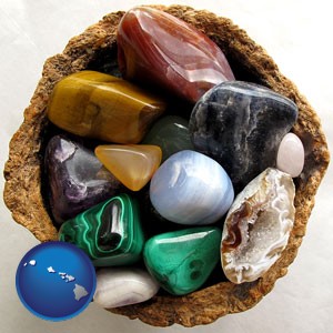 an assortment of polished gemstones - with Hawaii icon