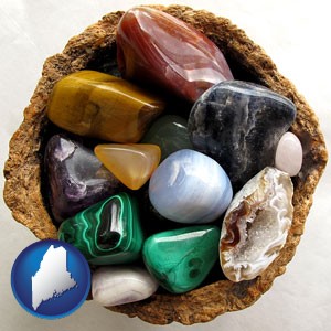 an assortment of polished gemstones - with Maine icon