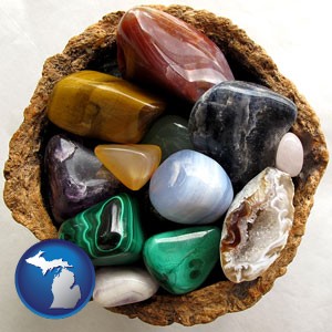 an assortment of polished gemstones - with Michigan icon