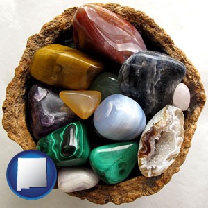 an assortment of polished gemstones - with New Mexico icon