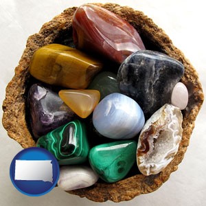 an assortment of polished gemstones - with South Dakota icon