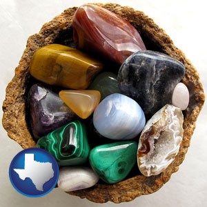 an assortment of polished gemstones - with Texas icon