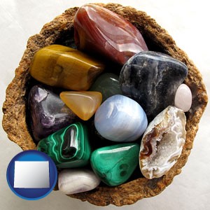 an assortment of polished gemstones - with Wyoming icon